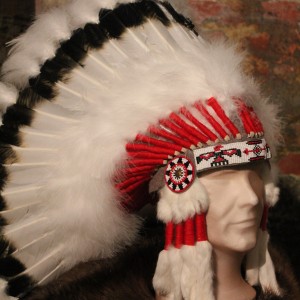 A replica of a feather and beaded headgear used by the high chiefs