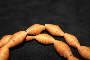 Beads made from thin stripes of wood popular in the Nordic countries in the 70's Sweden