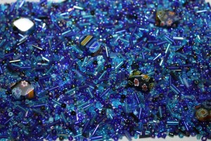 Variety of modern seed beads and bugle beads some millefiori